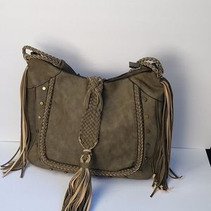 A beautiful shoulder bag. With tassels on the side